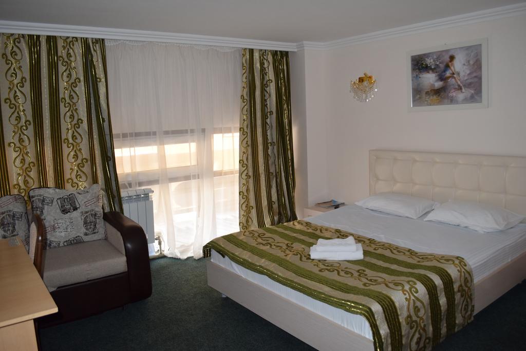 Bayterek Hotel Астана Стая снимка